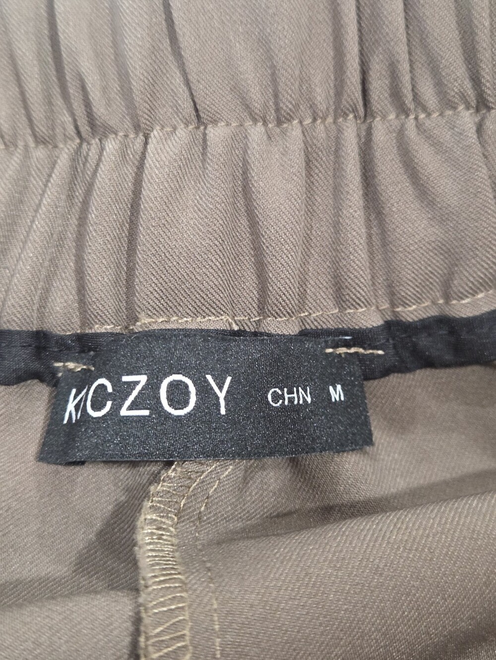 Pleated High-Rise Wide Leg Pants in Olive - Picture 6 of 12